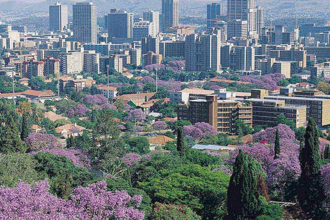 Pretoria city travel scene with landmarks, gardens, and heritage atmosphere